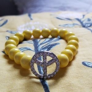 Peace bead stretch bracelet yellow